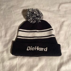 Die Hard Black And White Toboggan Hat With Poof Ball